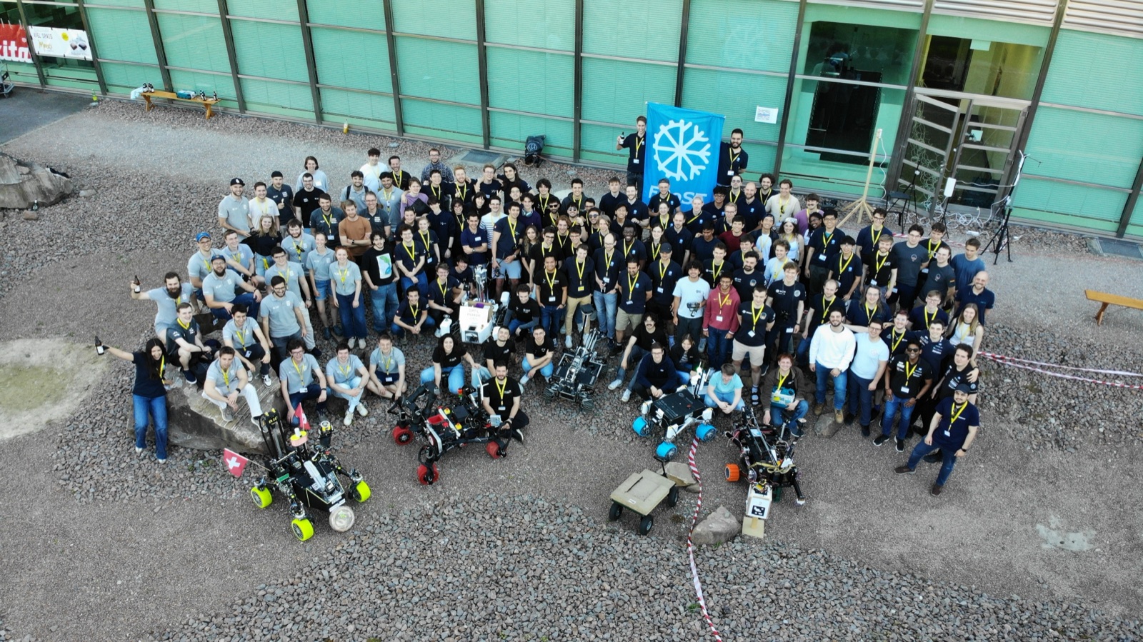 Top-down view of the FHNW Rover — chassis, camera masts and manipulator arm